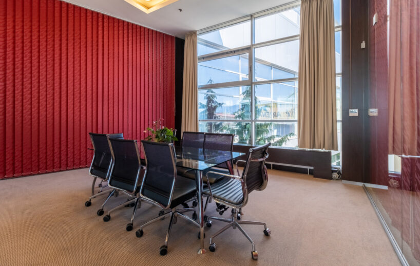 Alpha meeting room with boardroom seating.