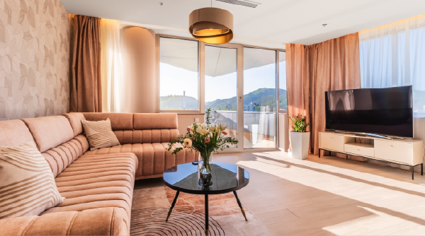 Superior Studio living room with a mountain-view balcony.