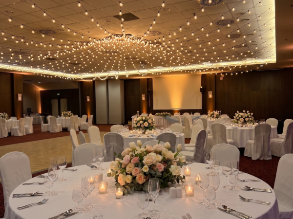 Banquet hall prepared for a wedding reception.